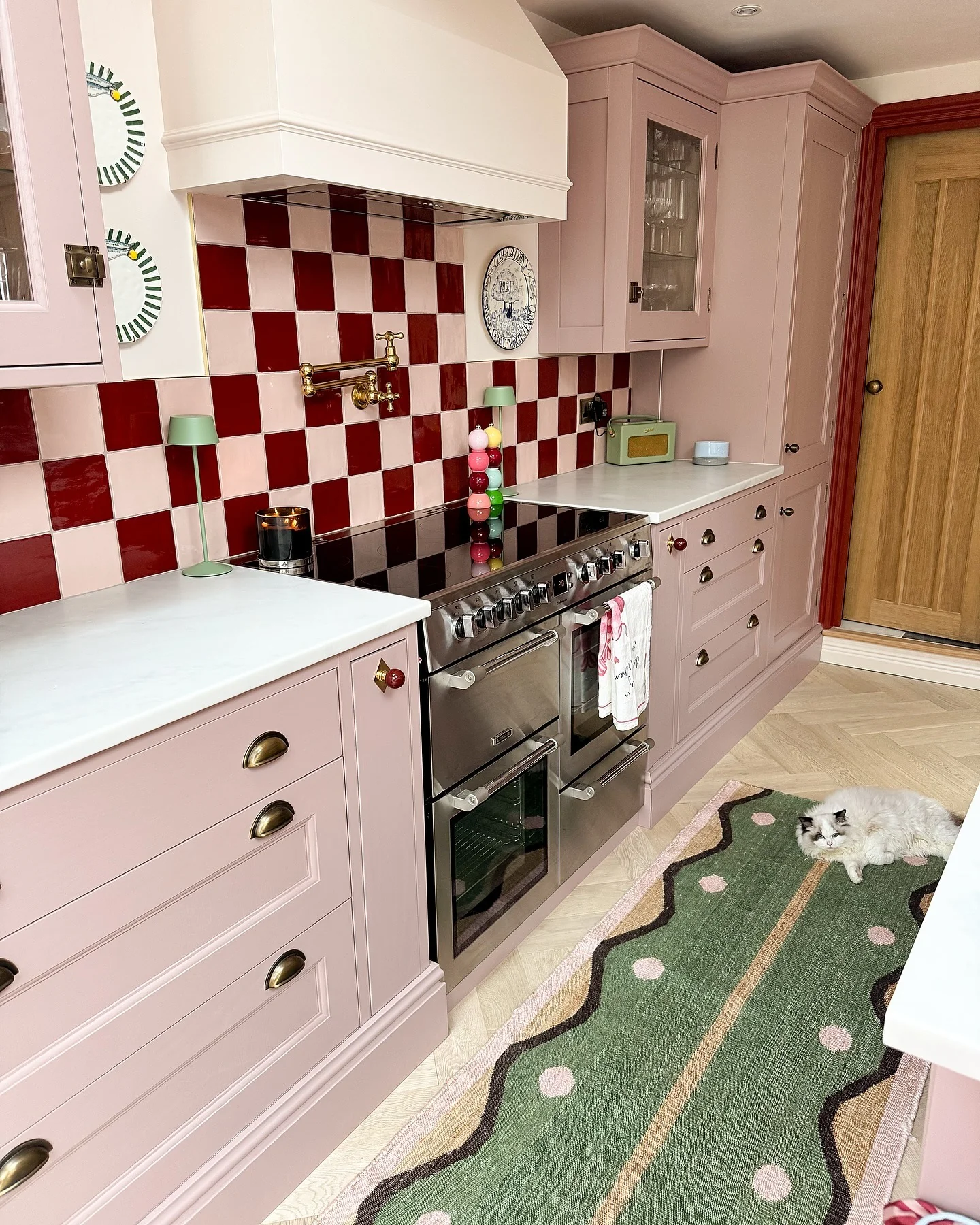Checkerboard Backsplash Adds Graphic Punch to Pink Kitchen