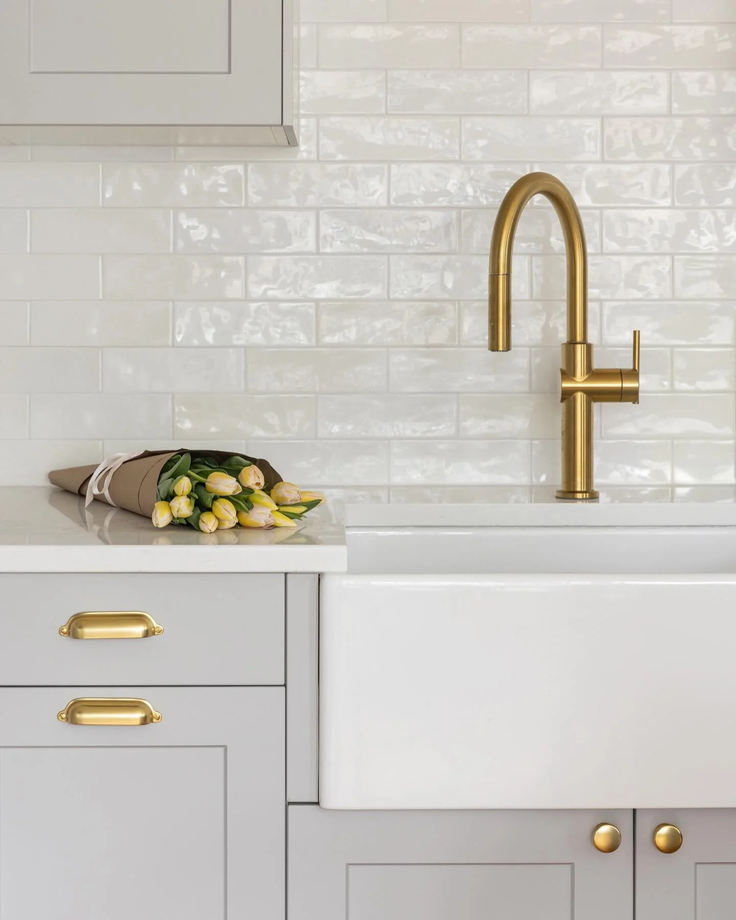 Shimmering White Subway Tile Backsplash Adds Depth