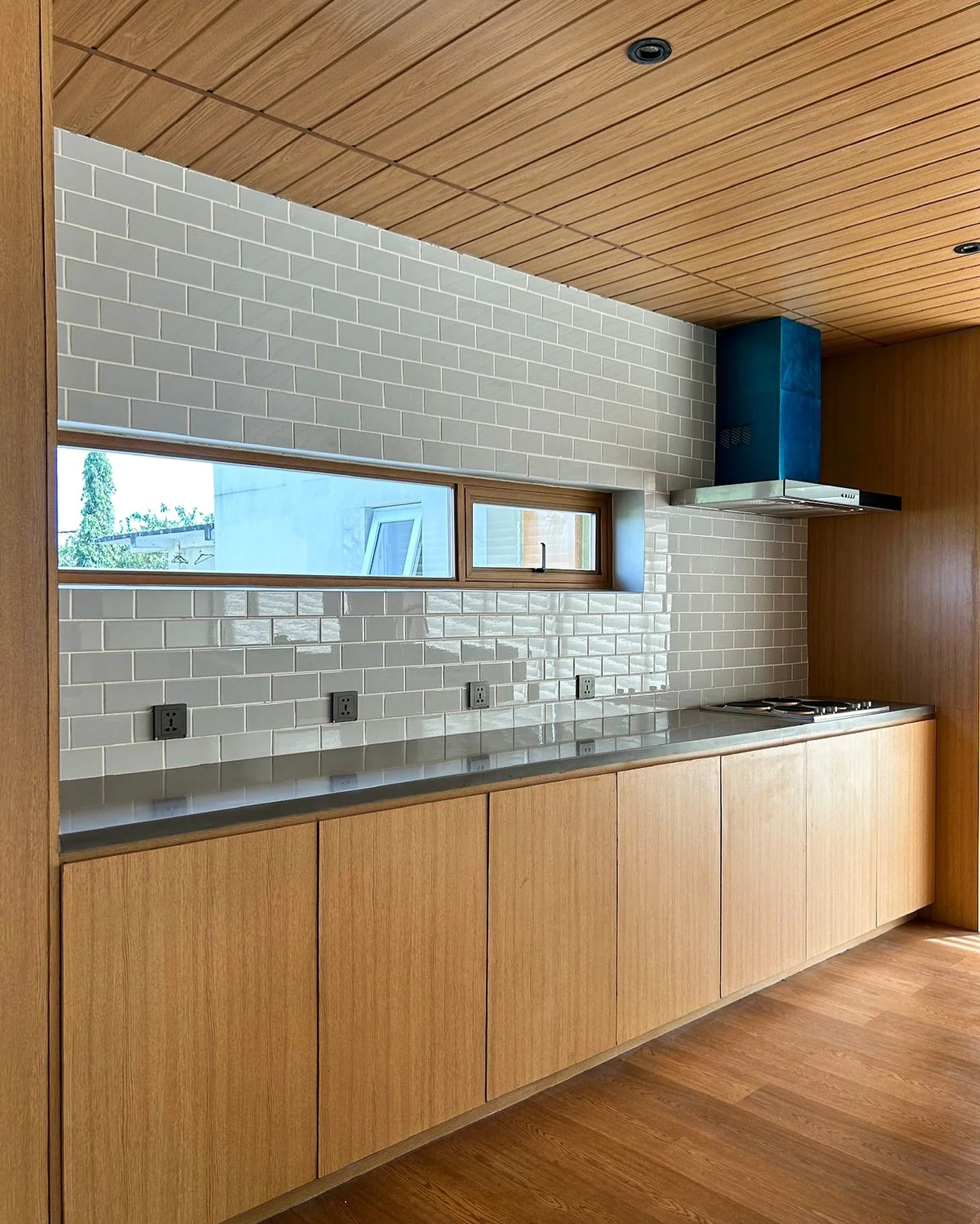 Light Grey Subway Tile Backsplash for a Clean Backdrop