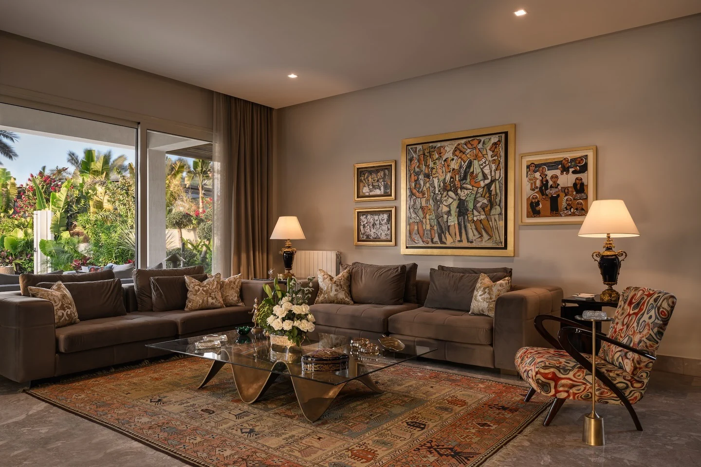 Large Oriental Rug Defines Seating Area on Stone Floors