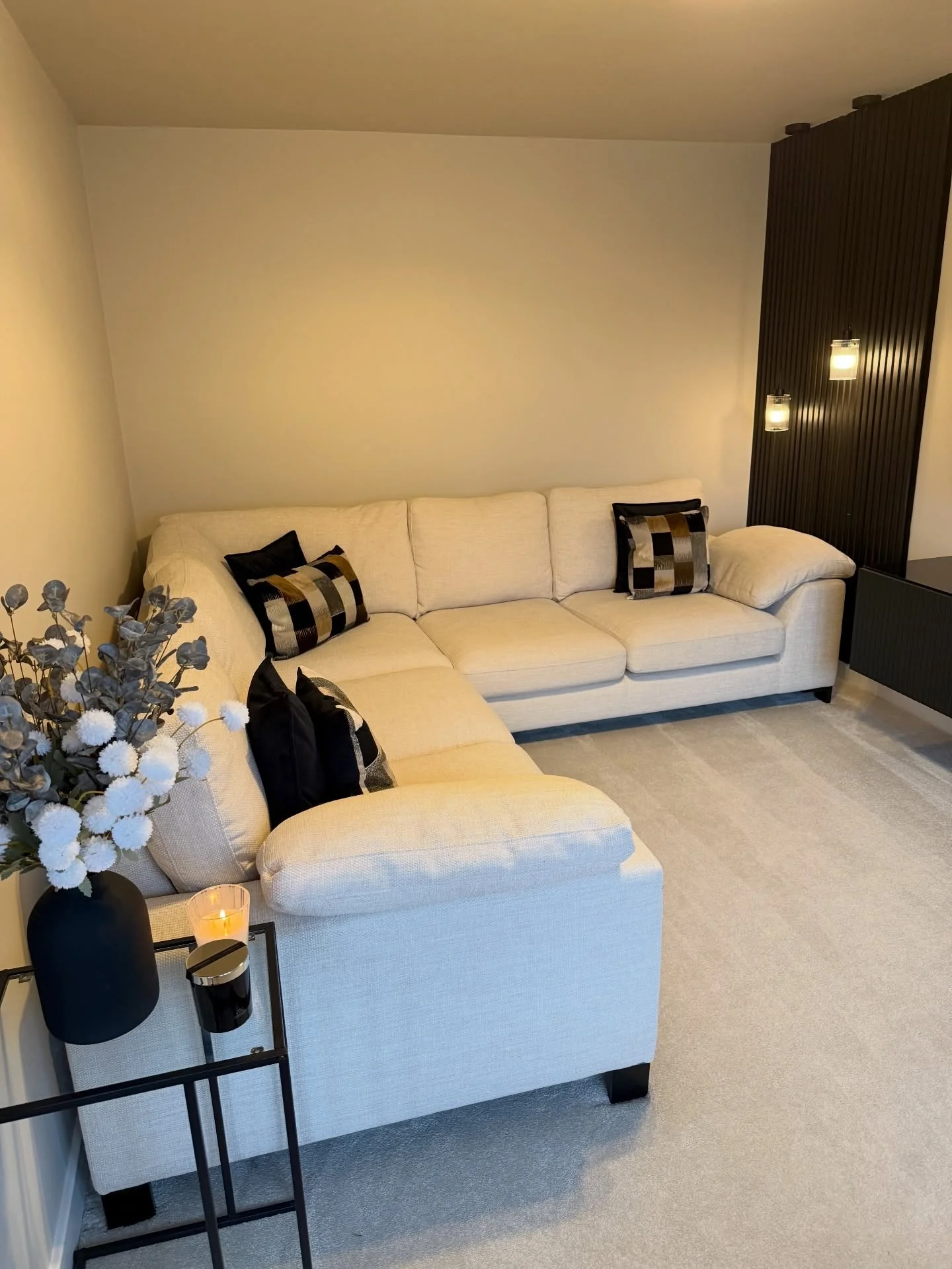 Light Gray Carpet Creates a Soft Foundation for a Sectional Sofa