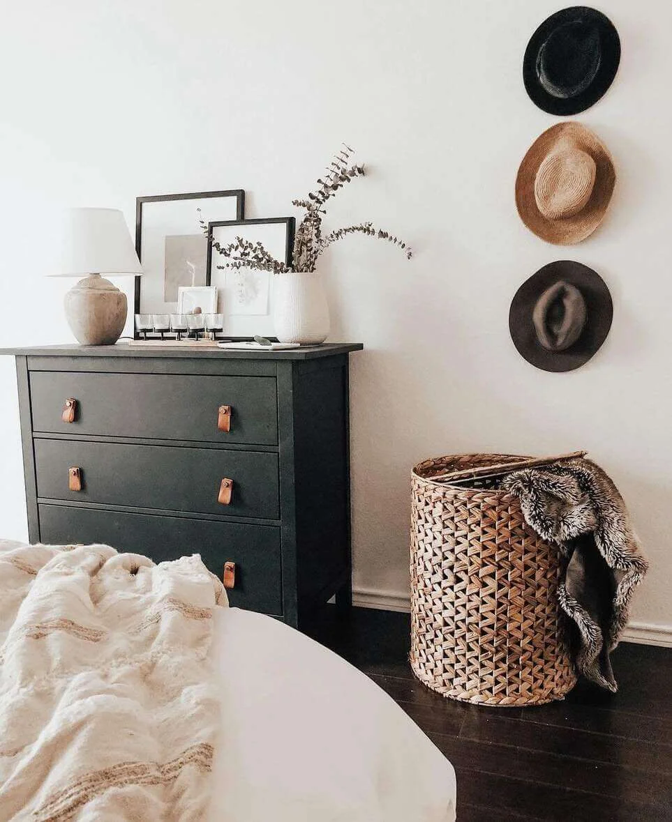 Three Hats Hung Vertically Create a Gallery Wall