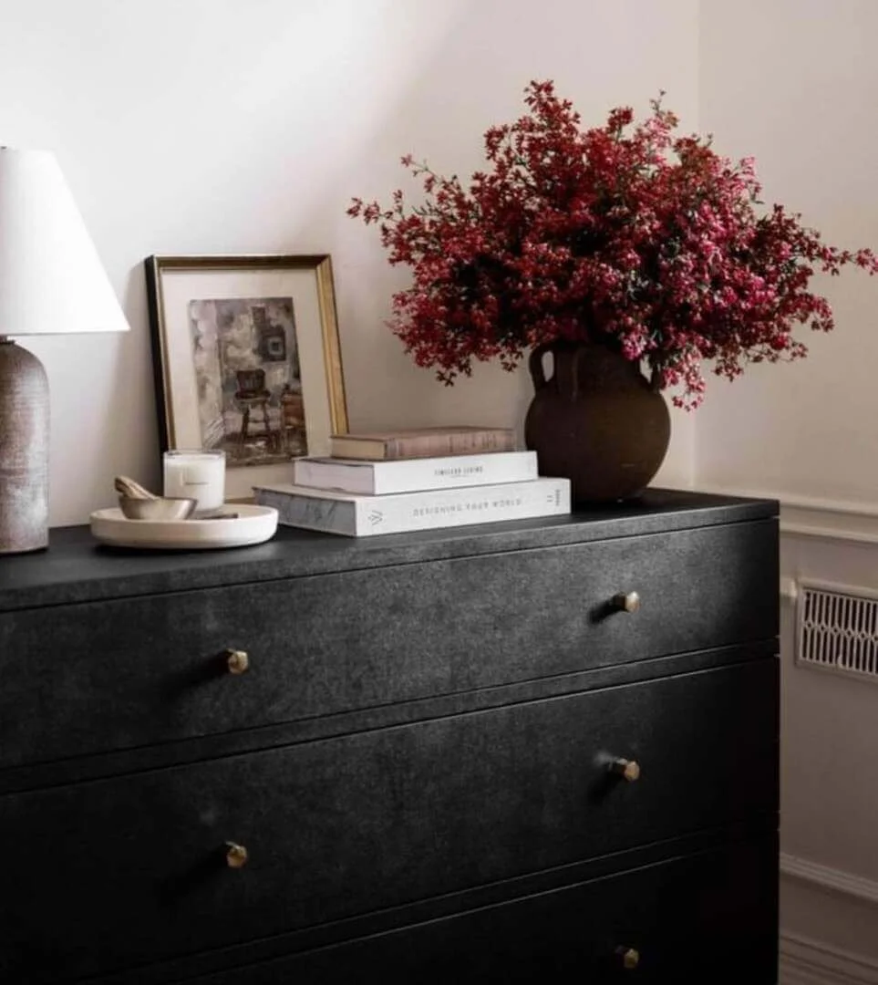 Dark Vase Anchors Dramatic Bouquet of Red Berries