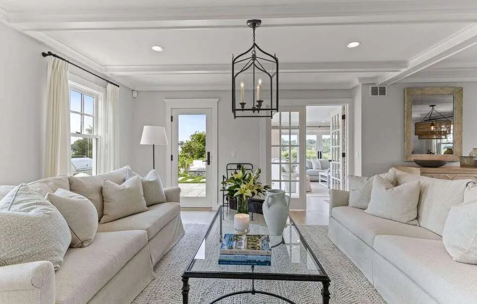 Ground Your Seating Area With a Glass and Metal Coffee Table