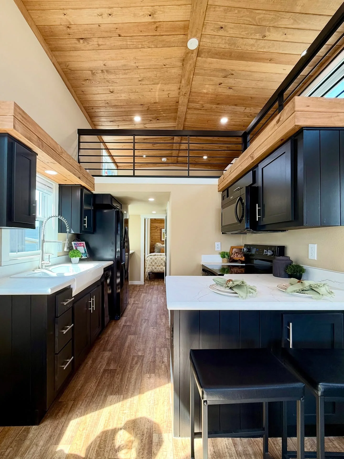 Tuck Black Bar Stools Under the Island for Compact Dining
