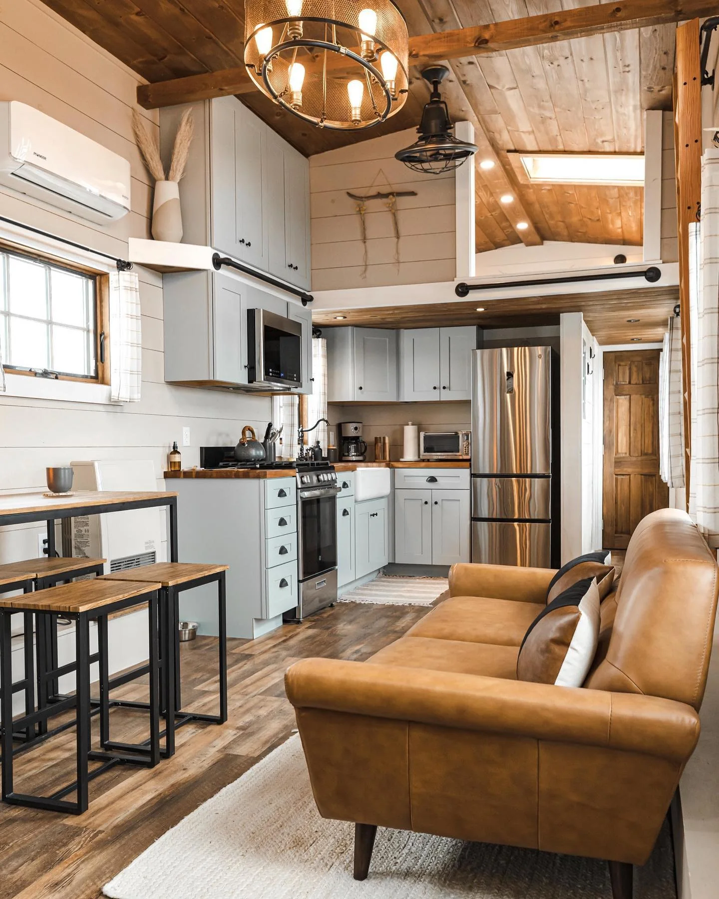 Choose Light Blue Cabinets With Black Hardware for a Serene Palette