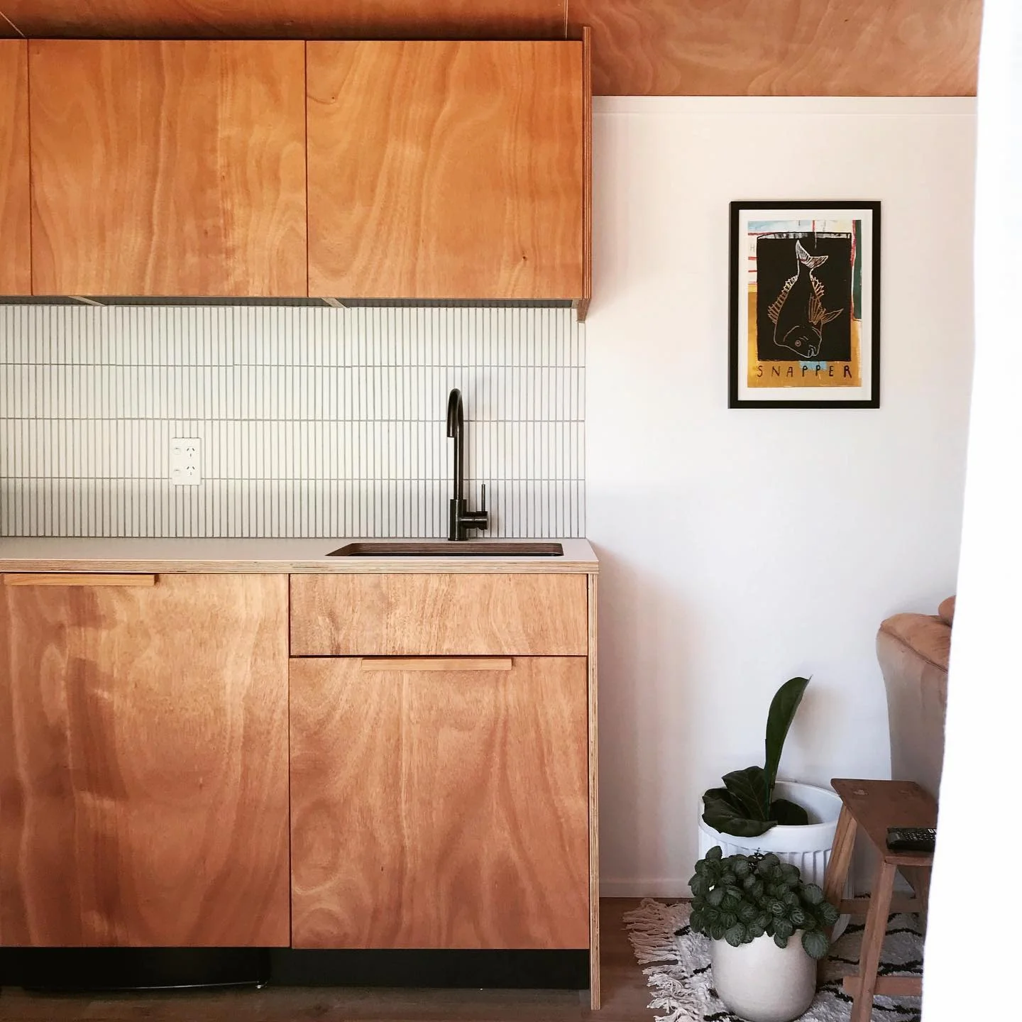 Vertical Tile Backsplash Adds Subtle Pattern Above Counter
