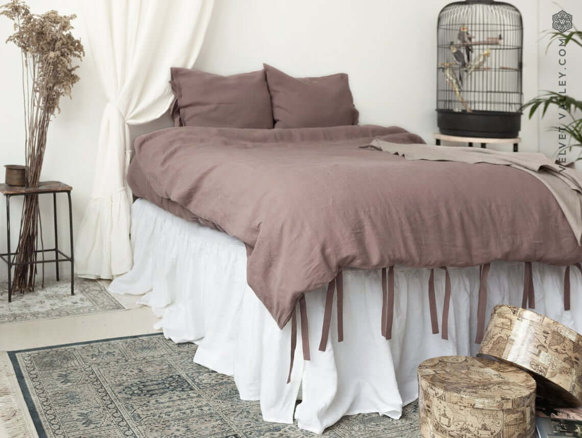 Soften Your Bed with Dusty Rose Linen and White Ruffles