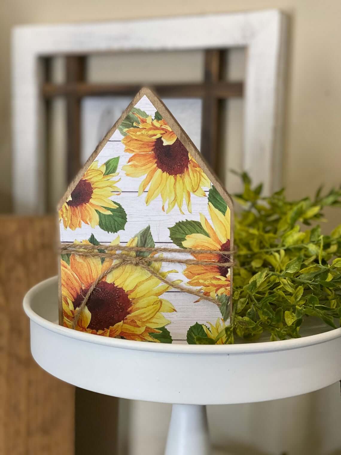 Wooden House Wrapped With Twine Adds a Sunflower Accent