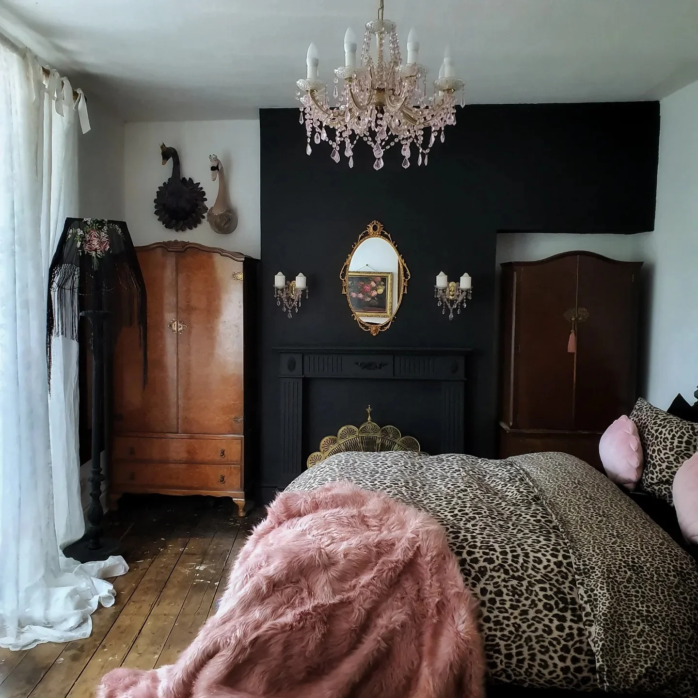 Frame Your Moody Scene with an Ornate Black Fireplace