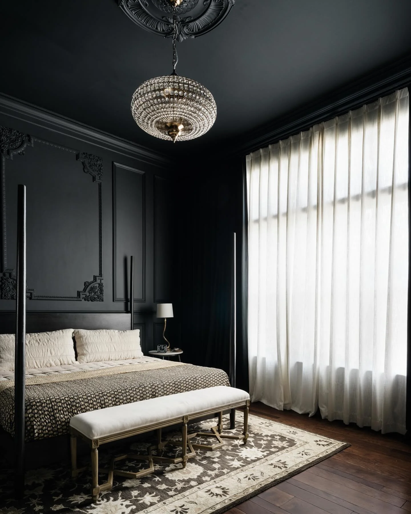 Ornate Black Wall Paneling Adds Dimension to Dark Bedrooms