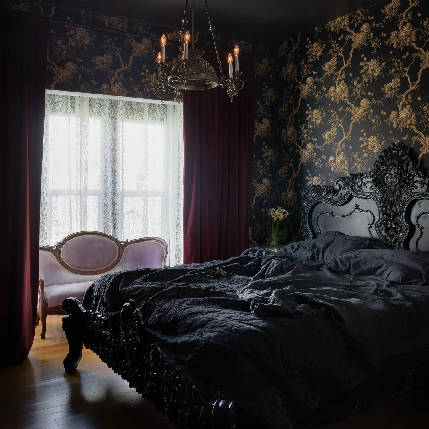 Dramatic Floral Wallpaper Sets a Moody Black Bedroom Scene
