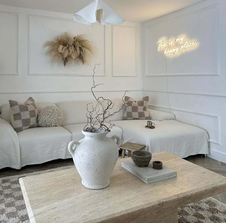 Textured White Urn Holds Dramatic Branches