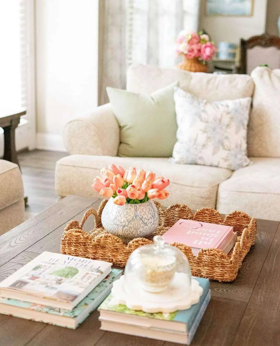 Woven Tray Organizes Pink Books and a Cloche