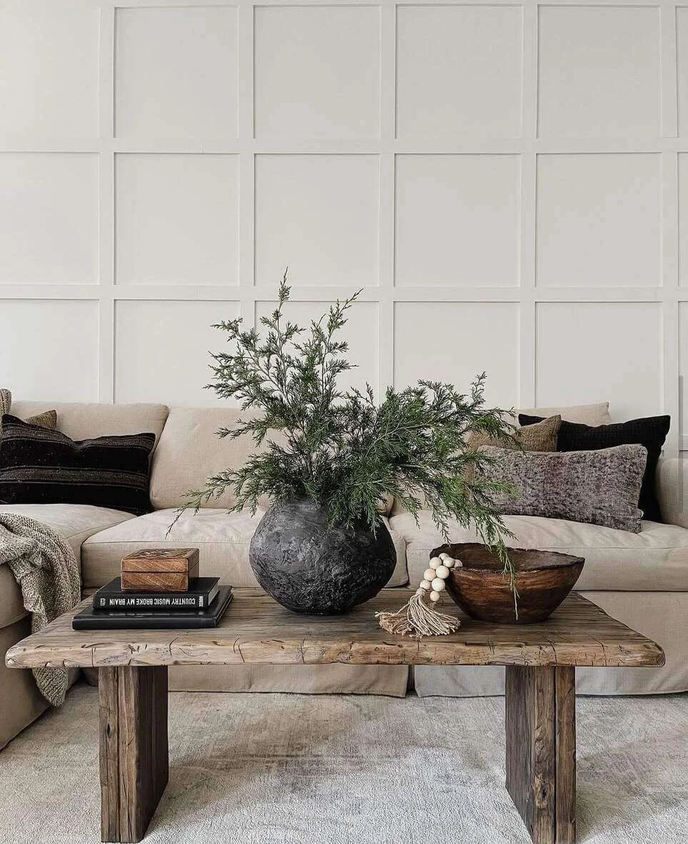 Textured Black Vase Holds Greenery for a Moody Display