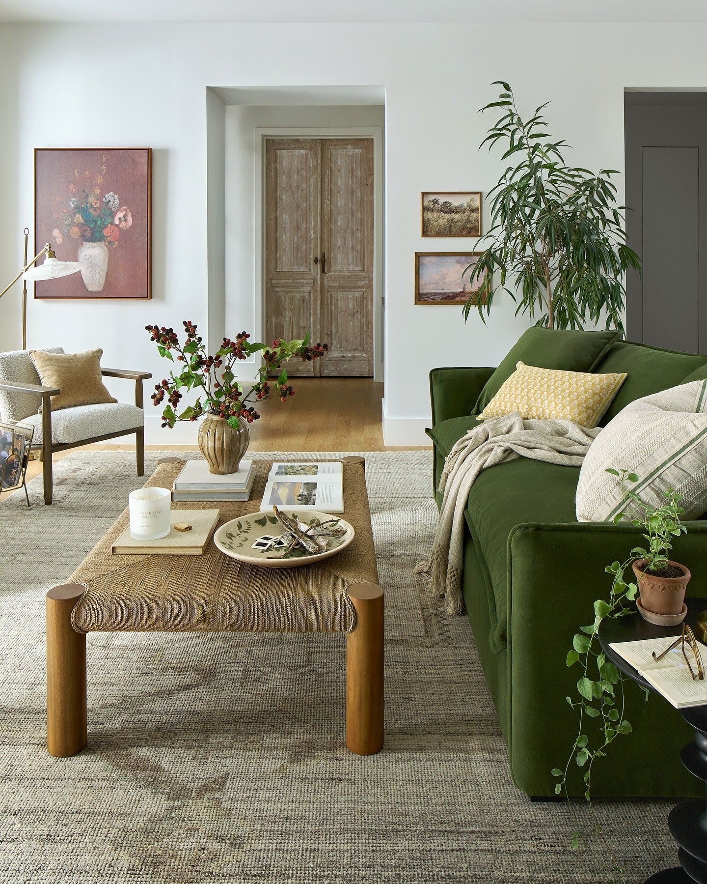 Green Sofa Anchors the Room with Textured Pillows