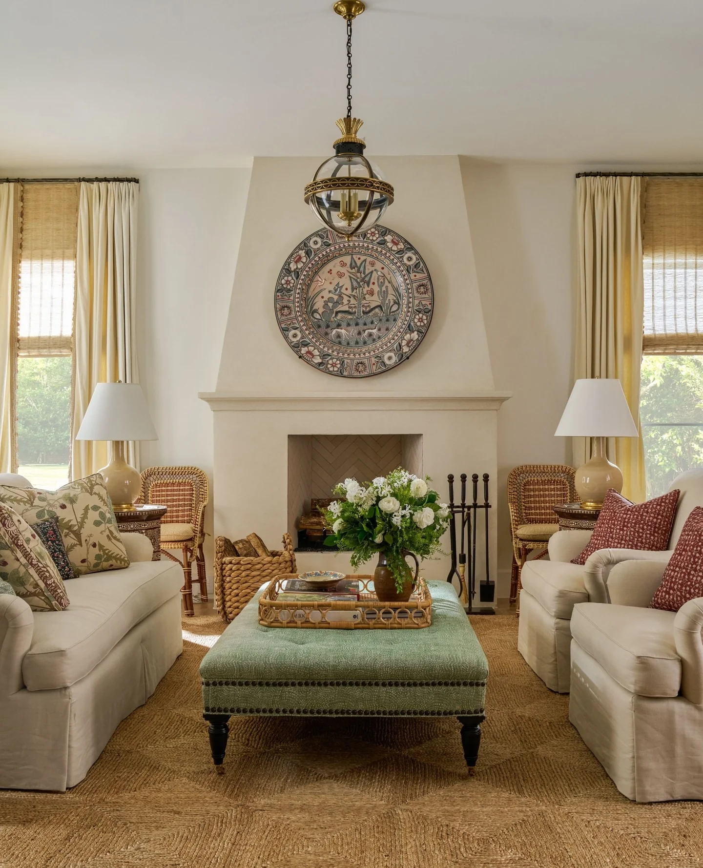 Large Decorative Plate Anchors the Fireplace Wall