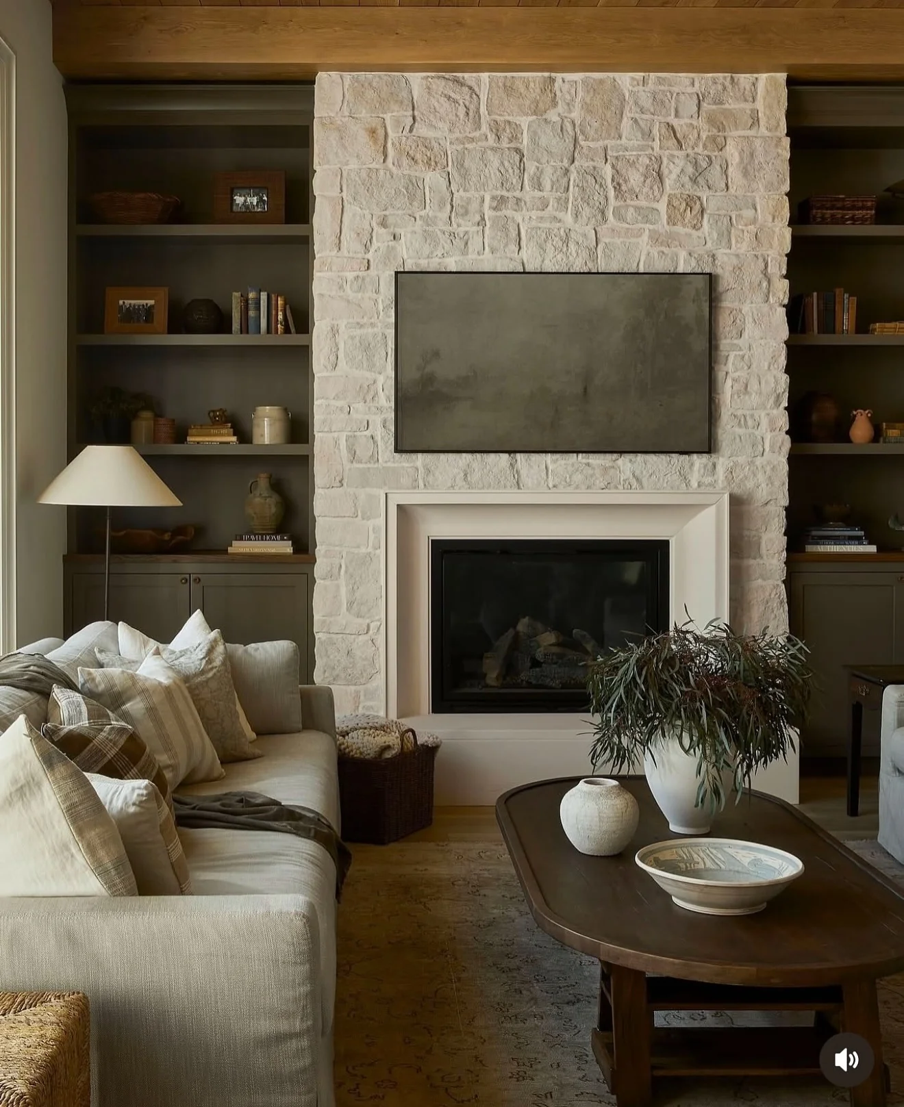 Subtle Artwork Above Fireplace Blends With Stone