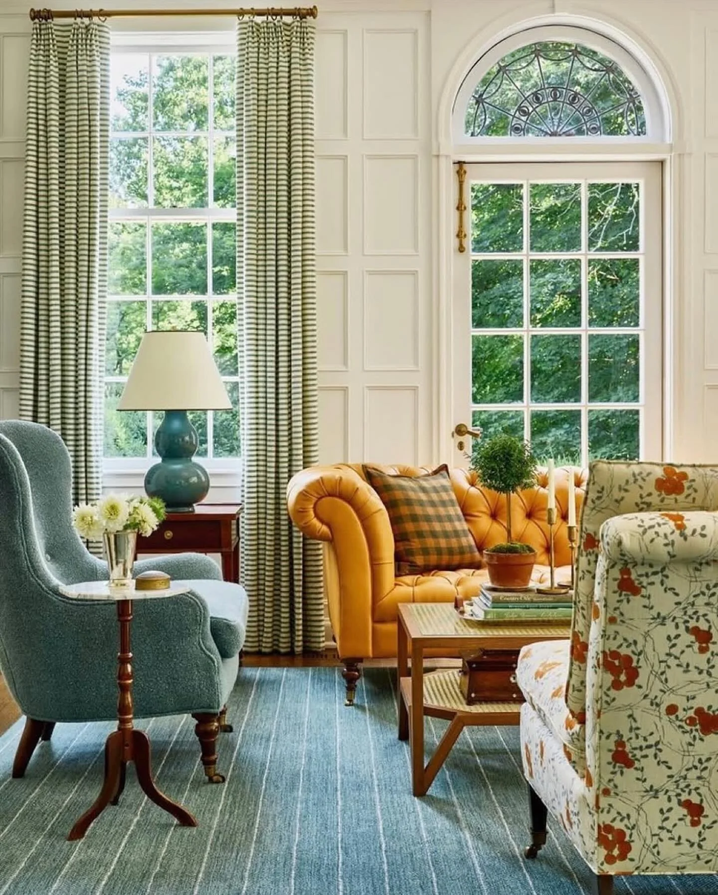 Arched Window With Decorative Grille Adds Architectural Interest