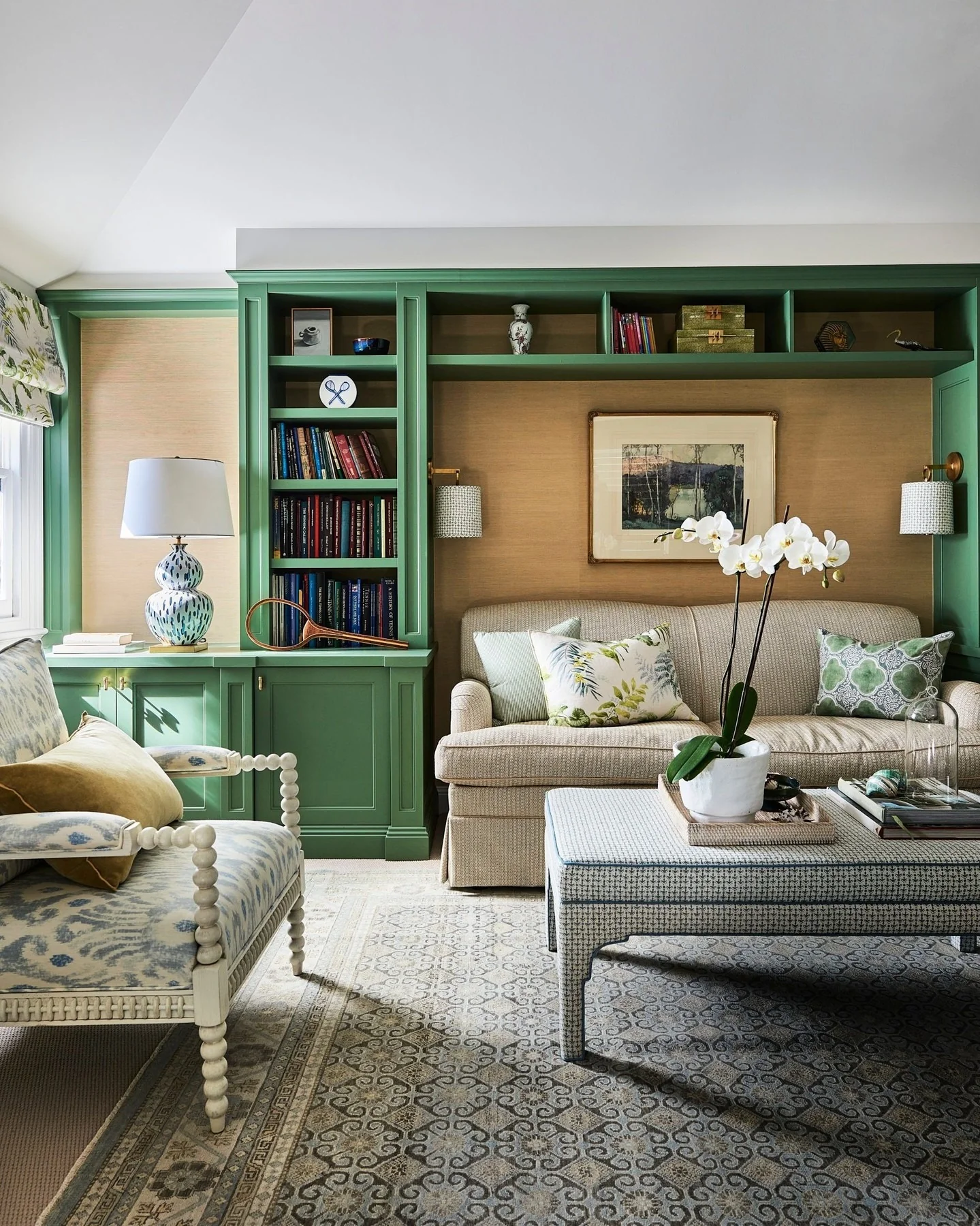 Green Built-In Shelving Frames a Textured Wall