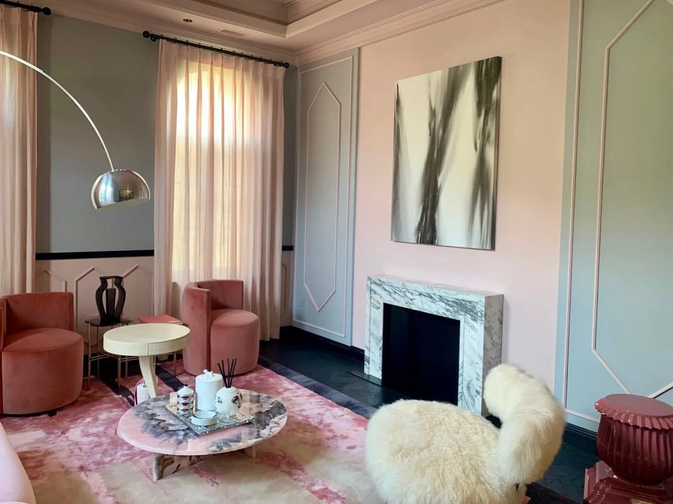 Marble Fireplace Adds Cool Contrast To Pink Walls