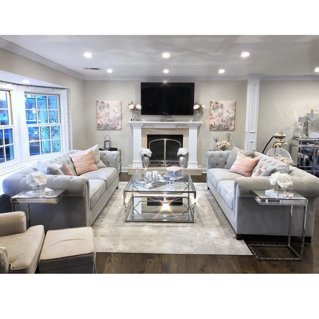 Mirrored Tray and Candle Groupings on a Glass Coffee Table