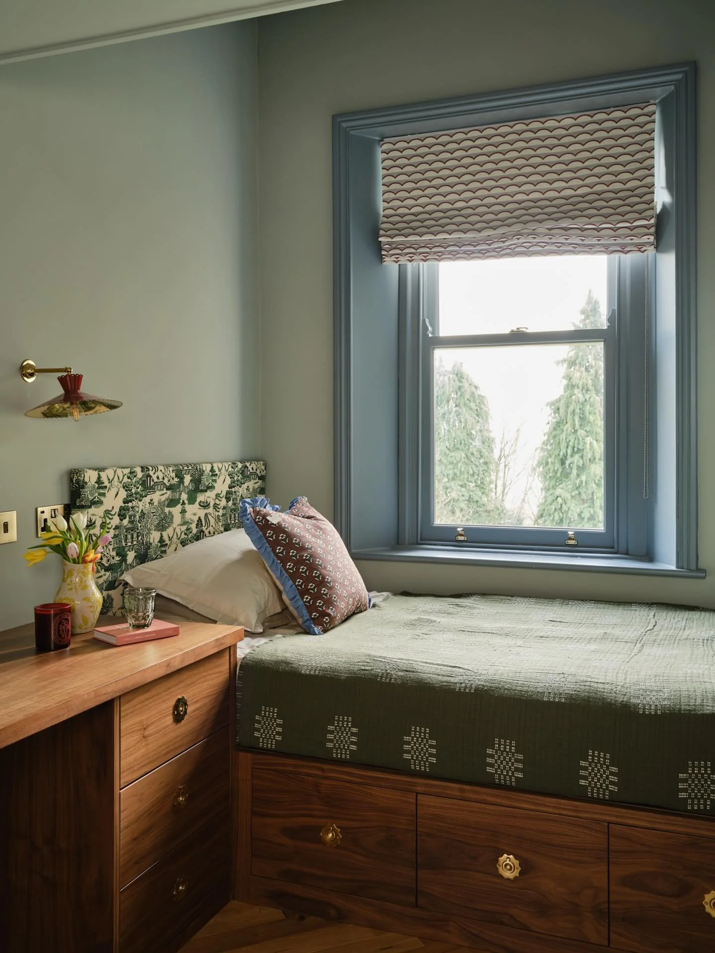Upholstered Headboard in Scenic Print Adds Patterned Depth