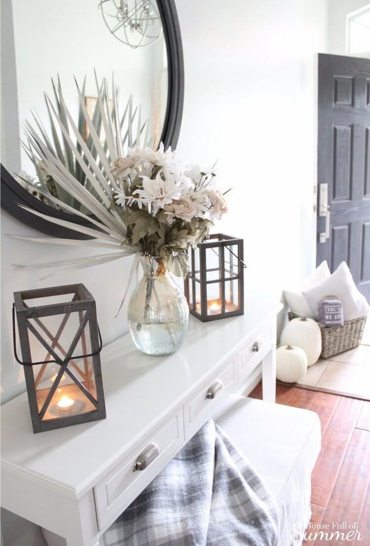 Lanterns and Dried Botanicals Create a Soft Glow