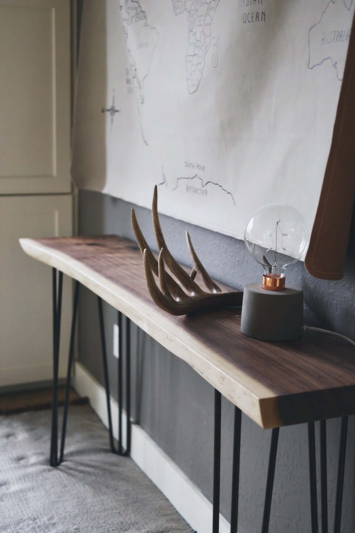 Live-Edge Console With Antler and Edison Lamp