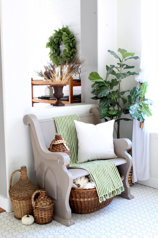 Flank a Bench with Woven Baskets for Cozy Entryway Storage