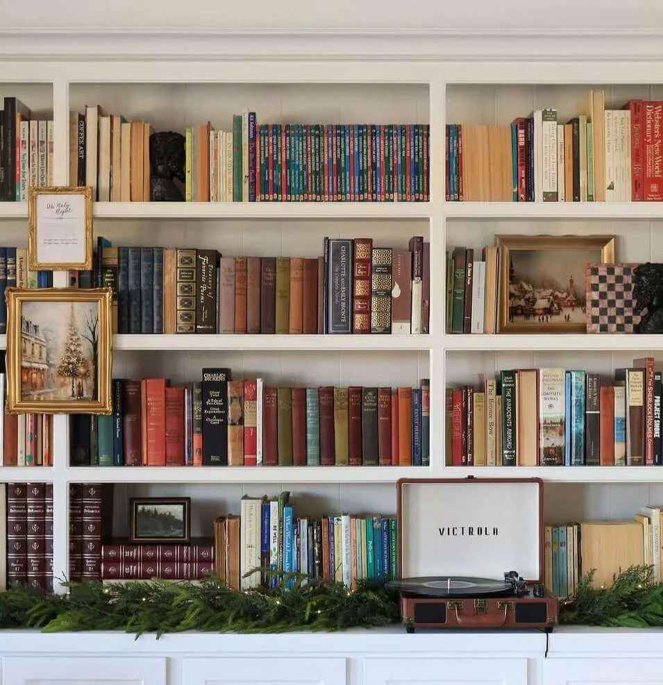Framed Art Adds Personal Touches Between Book Stacks