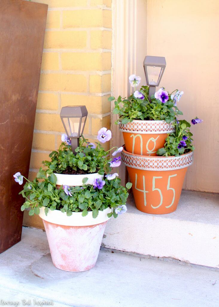Stack Planters With Solar Lights for a Layered Entryway Glow