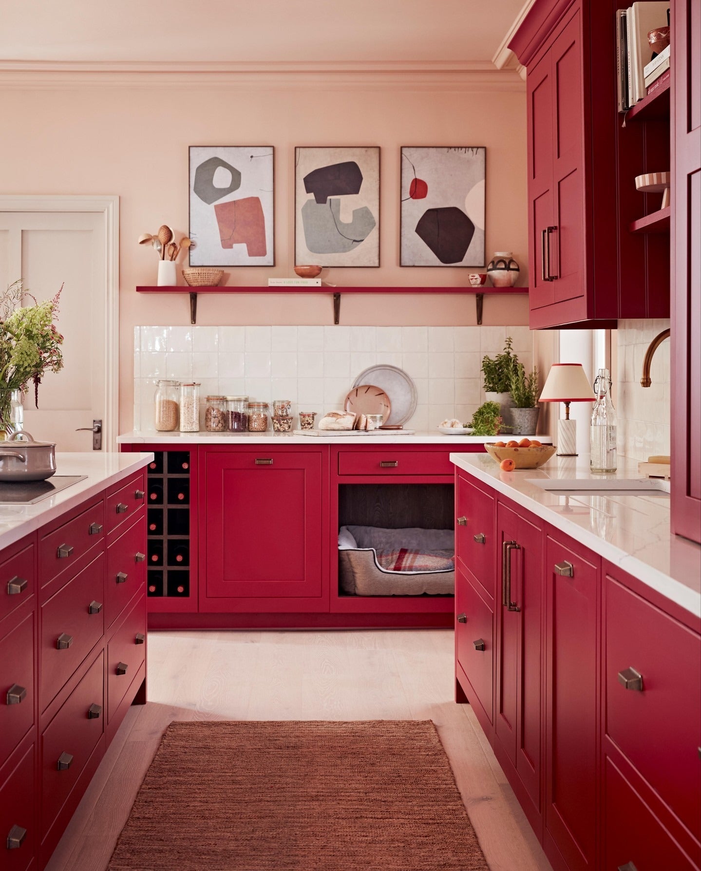 Integrate a Custom Dog Bed Nook into Your Red Cabinets