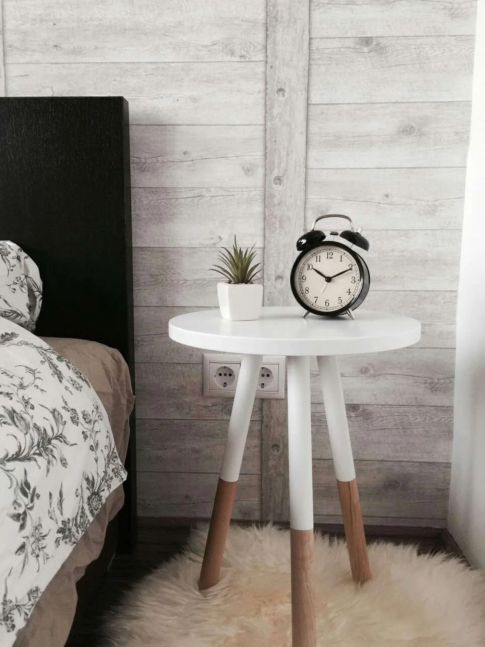 White Round Table With Wood-Accented Legs