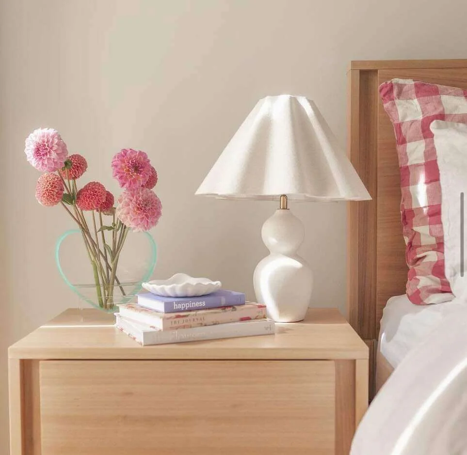 Stack books to elevate small decor pieces