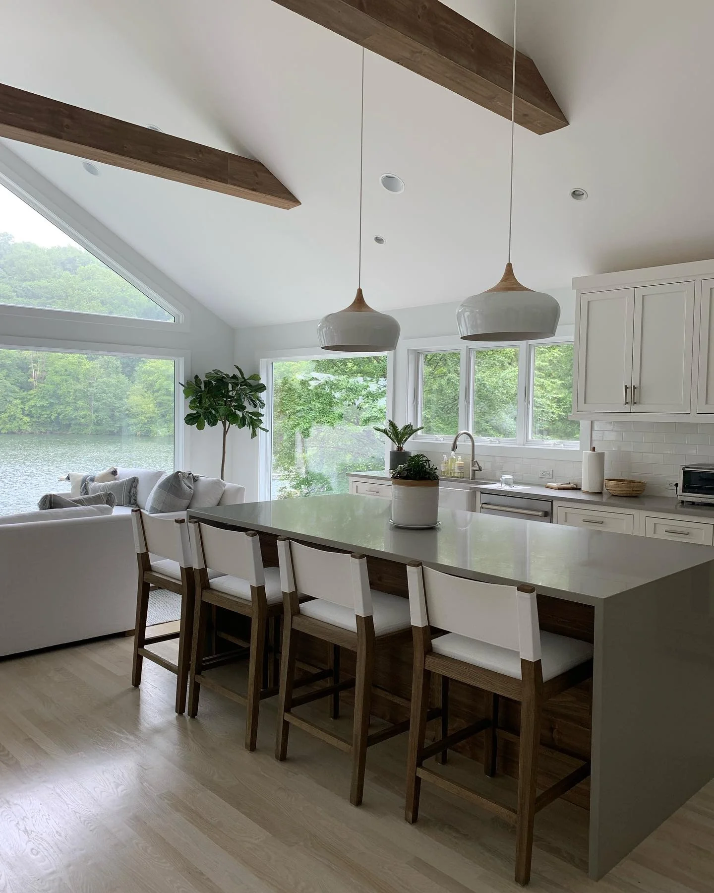 Sloped Wood Beams Add Drama to Vaulted Ceiling