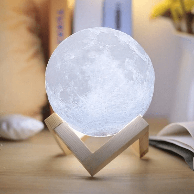 Place an Illuminated Moon Lamp on a Natural Wood Stand