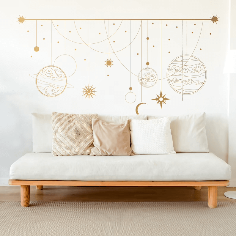 Gold Celestial Mobile Adds Whimsical Wonder Above Sofa
