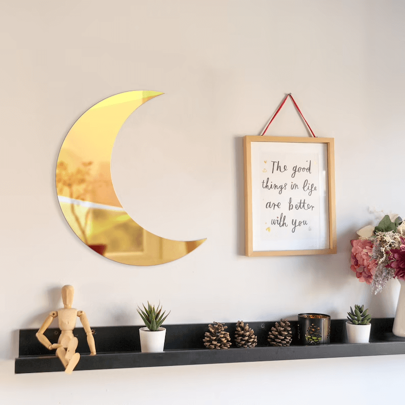 Reflect Light and Style with a Gold Crescent Mirror