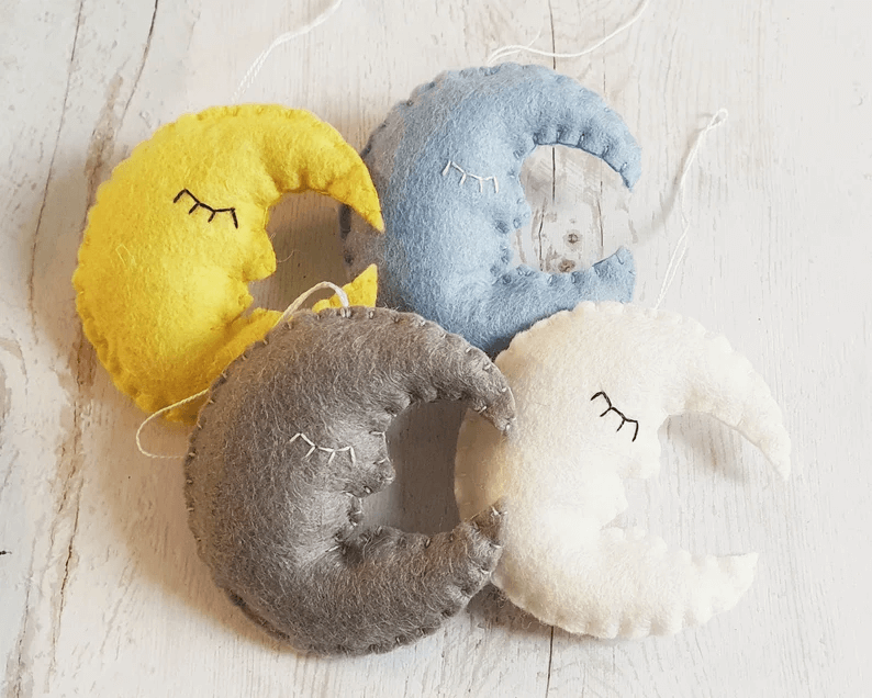 Soft Felt Moon Ornaments Add Sweetness to a Nursery