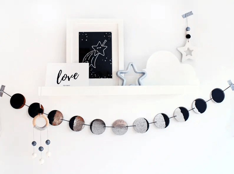 Moon Phase Garland Adds Celestial Interest to a Shelf