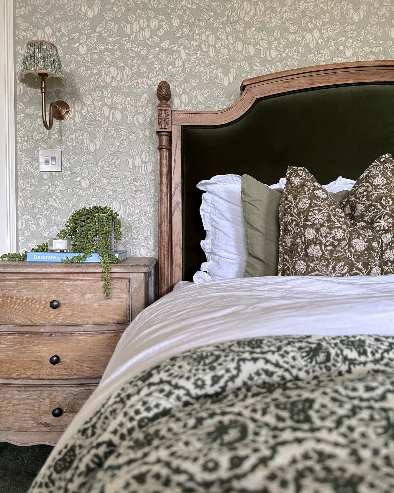 Introduce Richness with a Dark Green Velvet Headboard
