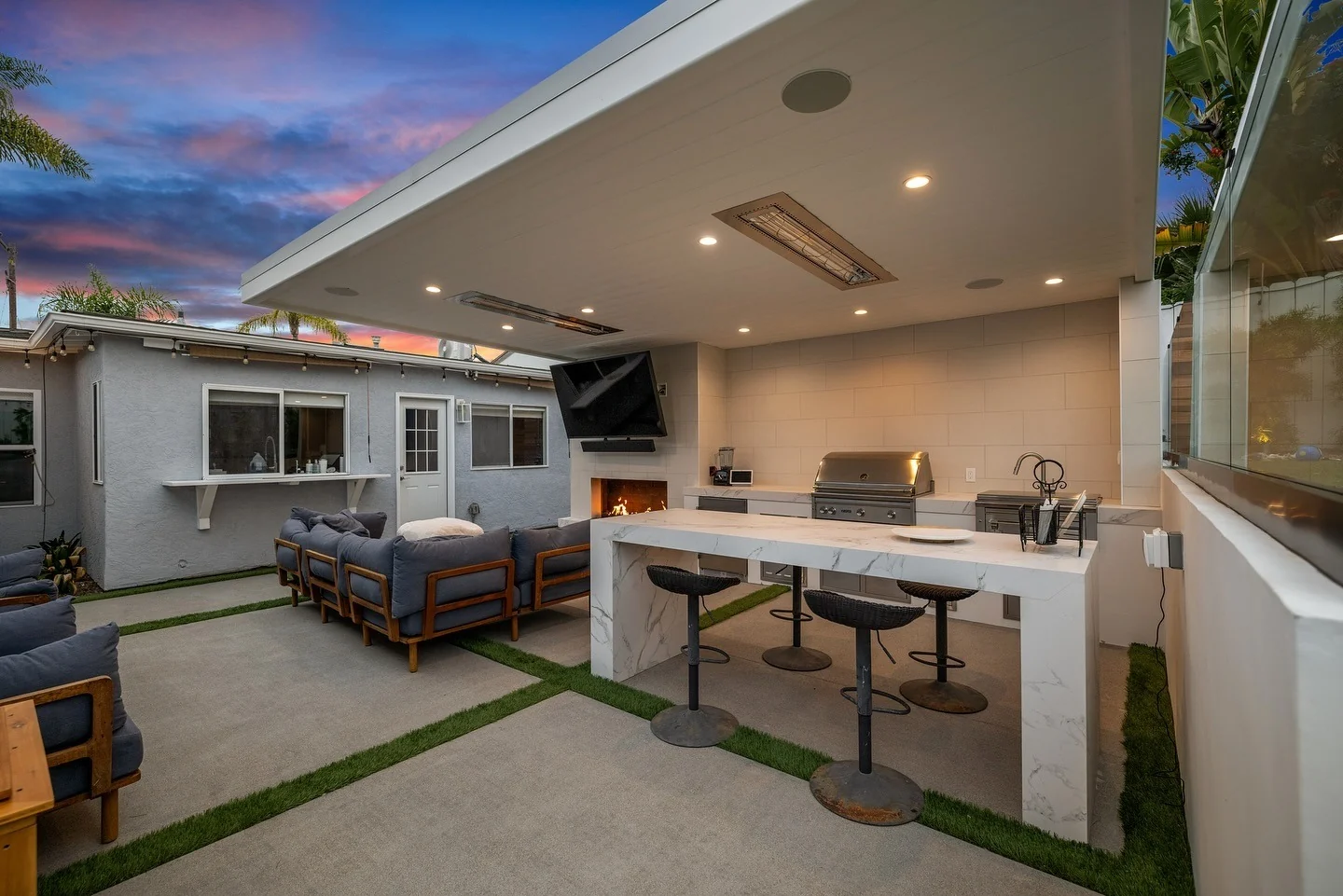 Marble Waterfall Island for a Polished Outdoor Bar