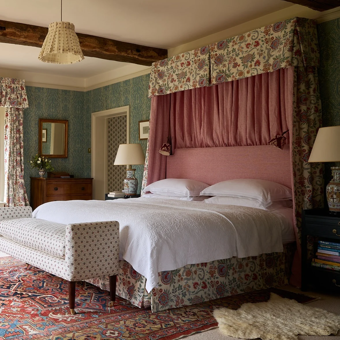 Pink Canopy Bed Creates a Cozy, Enclosed Sleeping Nook