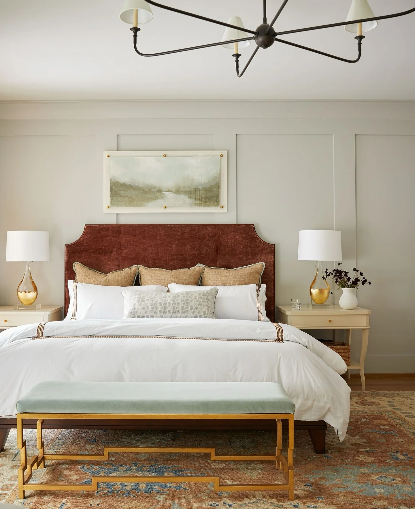 Anchor the Bed with a Rust Velvet Headboard