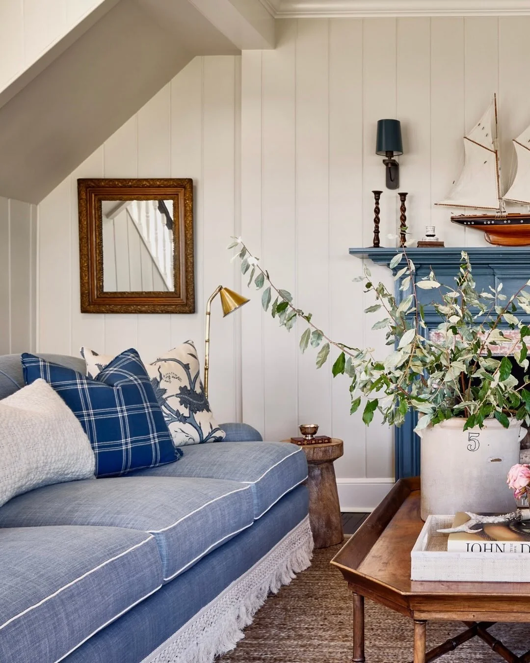 Blue Sofa with White Piping and Fringe