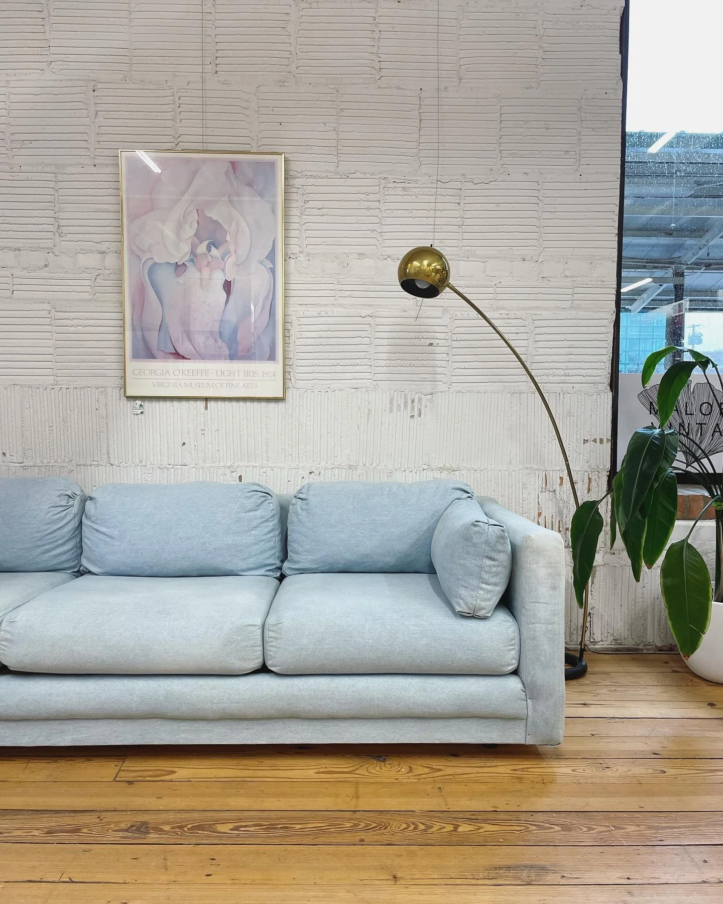 Pale Blue Sofa Paired with Abstract Floral Art