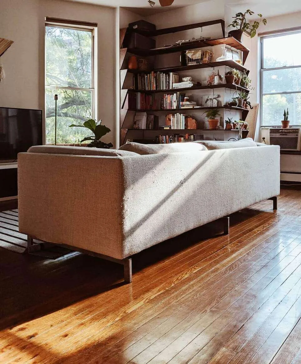 Corner Bookshelves Double as a Room Divider