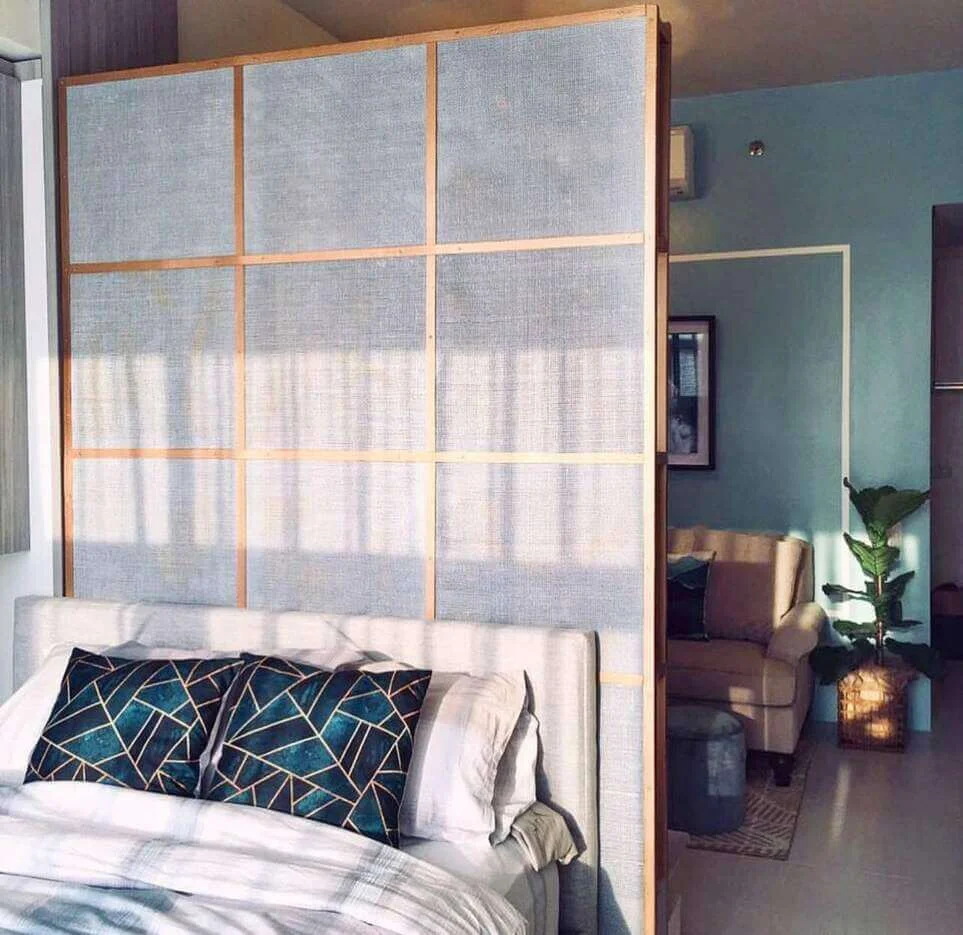 Textured Panels with Wood Frame Soften Divisions