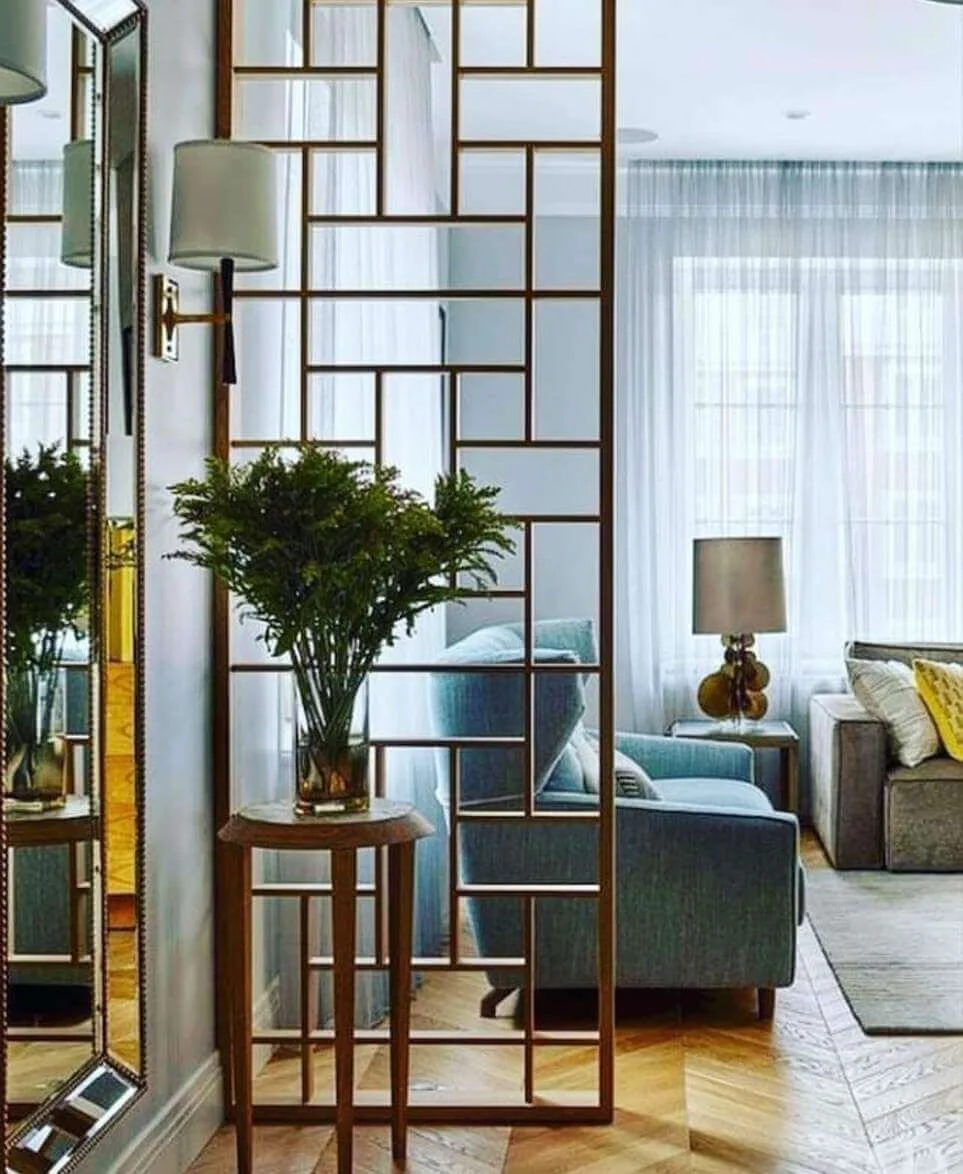 Geometric Mirrored Divider Adds Depth and Light